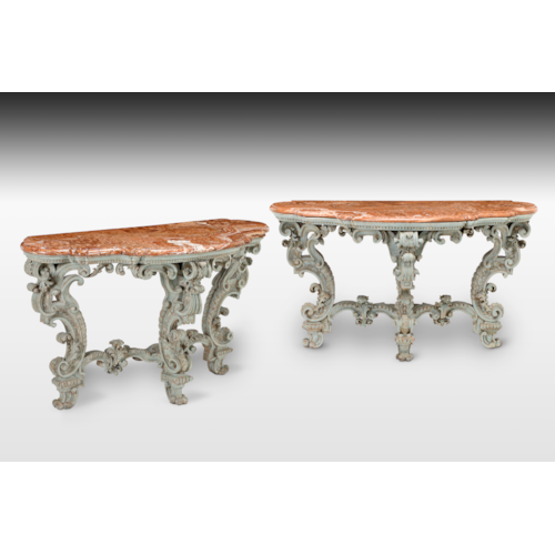 A magnificent pair of Italian, Piedmontese light blue patined and carved baroque Console Tables, with their original alabaster marble tops (alabastro fiorito), probably after the design of Filippo Juvarra.